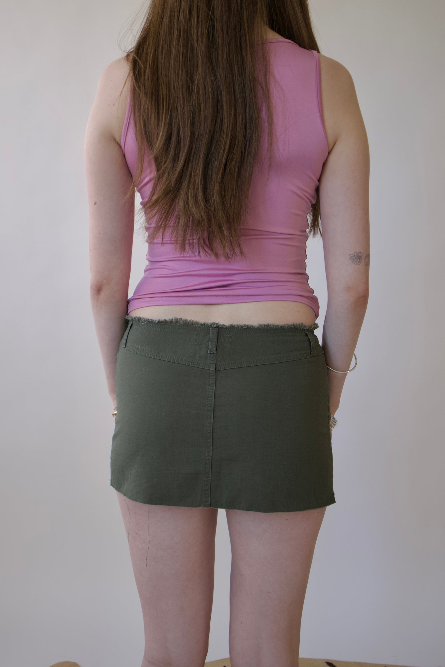 Green mini skirt
